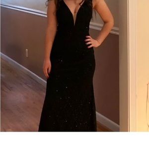 Black low plunge formal gown
